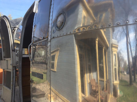 Airstream trailer reflecting our house in Dayton's Bluff Photo showing reflected image of our house on the side of the Airstream trailer