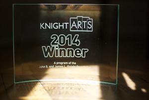 Photo of Knight Arts Challenge 2014 Winner curved clear glass award plaque 